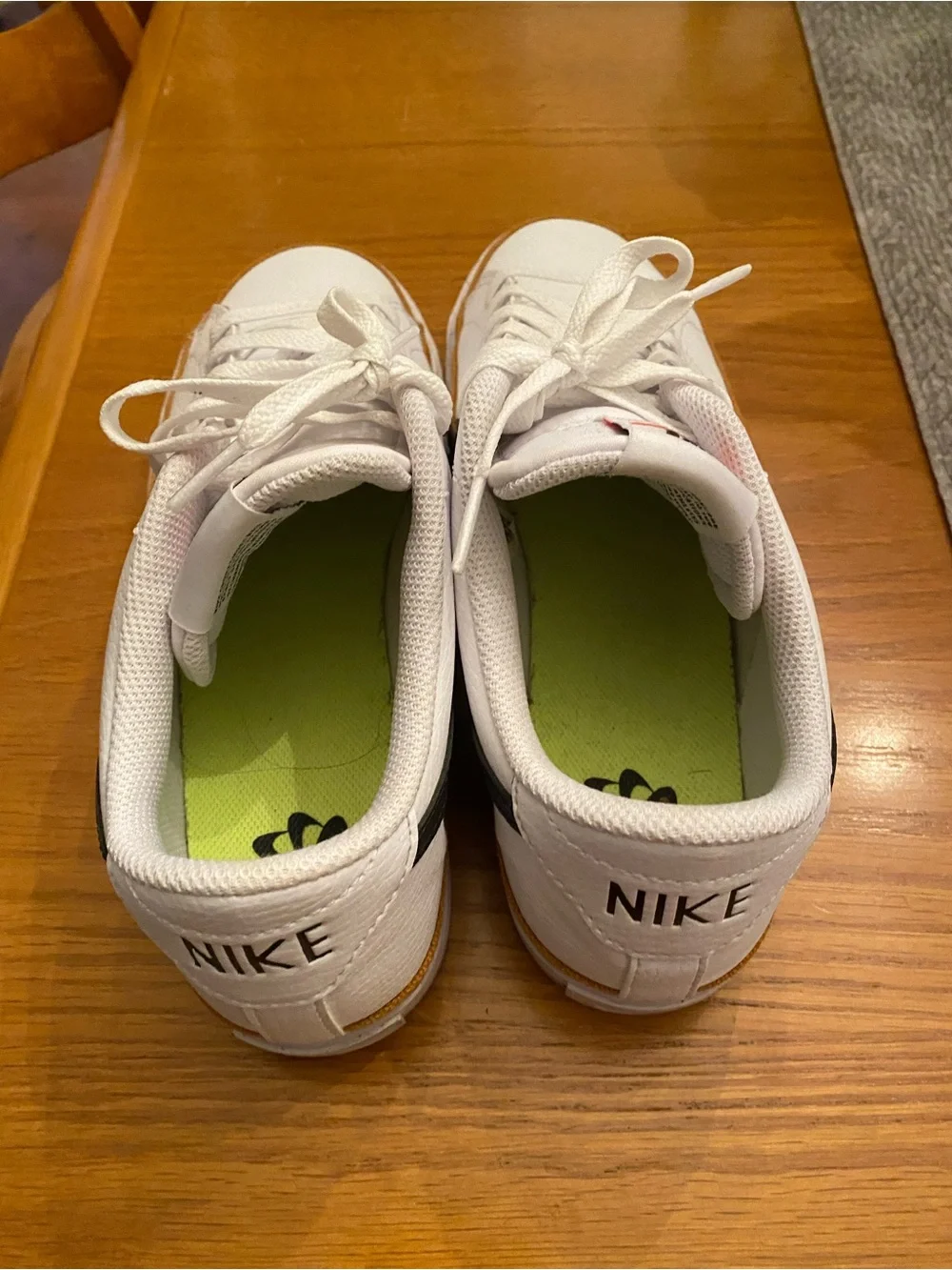 Nike Women’s  White Sneakers with Black Swoosh and Brown Trim